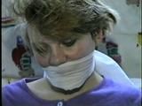 22 Yr OLD LISA IS RUBBER BAND BALL-GAGGED, MOUTH STUFFED, HANDGAGGED, OTM & CLEAVE GAGGED (D43-6)