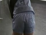 Jill Diamond cleaning up a cellar while wearing sexy shiny nylon shorts (Video)
