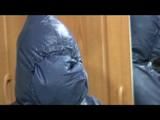 03:20 Min. video with Jill tied and gagged in shiny nylon rainwear