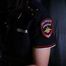 Police woman is smoking 3 strong reds in the studio