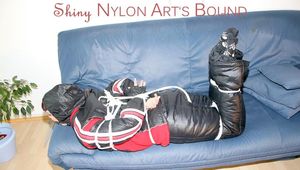 Jill tied and gagged wearing shiny nylon oldschool downwear (Pics)