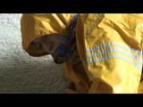 03:20 Min. video with Katharina bound in a yellow rainsuit