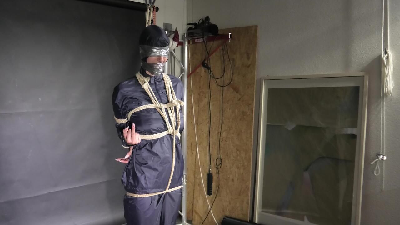Myxxxy Bound And Gagged In A Shiny Nylon Rainsuit