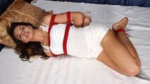 Sarah: barefoot girl in white tank-top and shorts, hogtied with hemp rope, wiggles and poses on the bed
