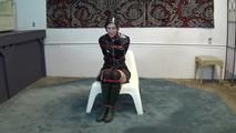 Ana in shiny raincoat bondage