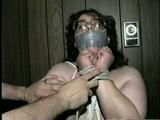 BIG.314 POUND BARBARA IS HANDGAGGED, MOUTH STUFFED, TAPE GAGGED & TIED WRISTS (D37-4)