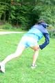 Enni wearing sexy blue shiny nylon shorts and rainjacket during her warm-up (Pics)