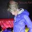 Watching Sonja searching for the right rainwear outfit changing shiny nylon rain pants and rain jackets (Pics)