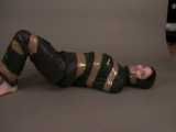Get 4 classic videos with Lupi wearing shiny nylon rainwear beeing tied and gagged