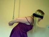 Miri is cuffed up and blindfolded