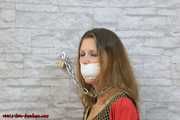 Damsel Sophia cuffed with special rigid cuffs