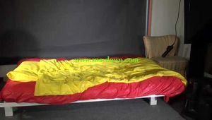 Get an archive Video with Sandra enjoying her shiny nylon Downwear