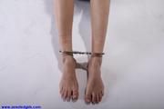 2 girls in steel bondage