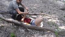 Nelly tied between two trees 1/2