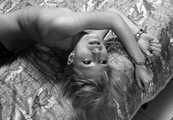 Alina: topless barefoot Alina in black panties, cuffed with steel handcuffs and legcuffs, poses and stimulates herself