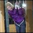 Pia tied with ropes overhead and gagged with a ballgag wearing sexy rain pants and a rain jacket (Video)