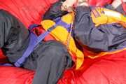 *** HOT HOT HOT*** NEW MODELL*** DESTINY wearing a sexy blue/red shiny nylon rain suit and a life jacket ties and gagges herself with cuffs on a sofa (Pics)