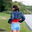 Sexy archive girl walking on a lake wearing a sexy shiny nylon shorts and an oldschool rain jacket (Pics)