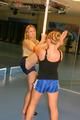 Katharina and Jenny during their workout in the fitness center wearing sexy shiny nylon shorts and tops (Pics)