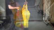 Marie tied and gagged in shiny nylon rainwear