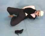 Dressed up Rozanka in a fantastic bondage session (video)