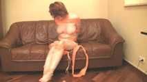 [From archive] Stella - mummified topless in cling film and hogtaped (video)