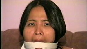 24 Yr OLD ASIAN VIETNAMESE DAISY IS WRAP TAPE GAGGED, BALL-TIED, TOE-TIED, BLINDFOLDED & TRIES TO MAKE CALL (D44-4)
