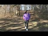 Alina walking in a lake wearing a supersexy purple down jacket and a jeans (Video)