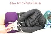 Mara tied and gagged on a white sofa in a reading lounge wearing a sexy purple shorts with shadow stripes and a black rain jacket (Pics)