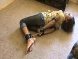 Valya hogtied in jeans