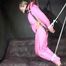 Sexy ***SANDRA*** wearing a hot pink oldschool downbib and a down jacket being tied and gagged with ropes and a clothgag hanging on the ceiling  (Video)