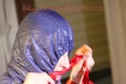 Sonja tied, gagged and hooded on a bed wearing supersexy shiny nylon oldschool downwear (Pics)