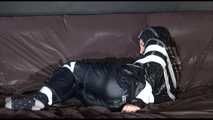 MARA tied, gagged and hoded with tape wearing a supersexy black rain suit (Video)