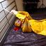 Pia tied and gagged in a shiny nylon rainsuit 