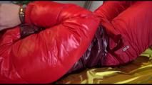 Jill ties, gagges and hoodes herself with cuffs wearing a sexy red shiny nylon down jacket and rain pants (Video)