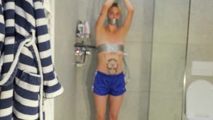 Myxxxy wetting her shiny nylon Shorts