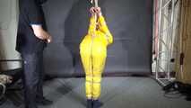 Marie tied and gagged in shiny nylon rainwear