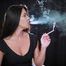 Delicious lady Tanya is engrossed in smoking a 120mm cigarette