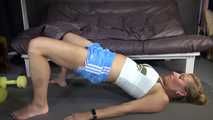 Watching sexy Sandra wearing a sexy lightblue shiny nylon shorts and a white top during her workout with barbells (Video)