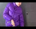 Get an Archive Video with Mara enjoying a shower with her shiny nylon downjacket