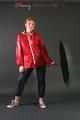 Anastasia posing in a foto studio wearing supersexy rainwear (Pics)