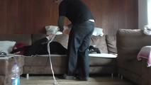 Angi hogtied on couch 1/2