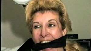 . 44 Yr OLD HOUSEKEEPER GAGS HERSELF 2 TIMES WITH HER PANTYHOSE, IS BALL-GAGGED, MOUTH STUFFED, HANDGAGGED, CLEAVE GAGGED & TIED WITH ROPE (D59-6)