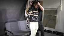 Marie bound and gagged in a shiny nylon Downjacket