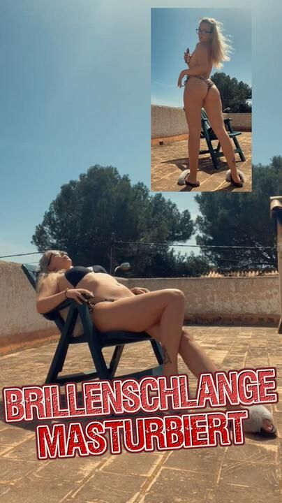 Naughty bespectacled snake takes a sunbath and masturbates