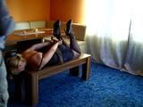 Posing cuffed on the bench