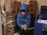 Archive girl tied, gagged and hooded in a cellar wearing a shiny light blue downcoat (Video)
