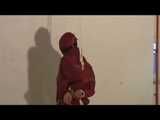 0210 min video with Alina tied and gagged in shiny nylon shorts