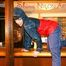 Jill posing in a bar wearing ONLY a sexy rainwear combination (Pics)