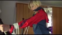 Pia tied and gagged on a crosstrainer for doing her workout well wearing a hot shiny nylon shorts and a rain jacket (Video)
